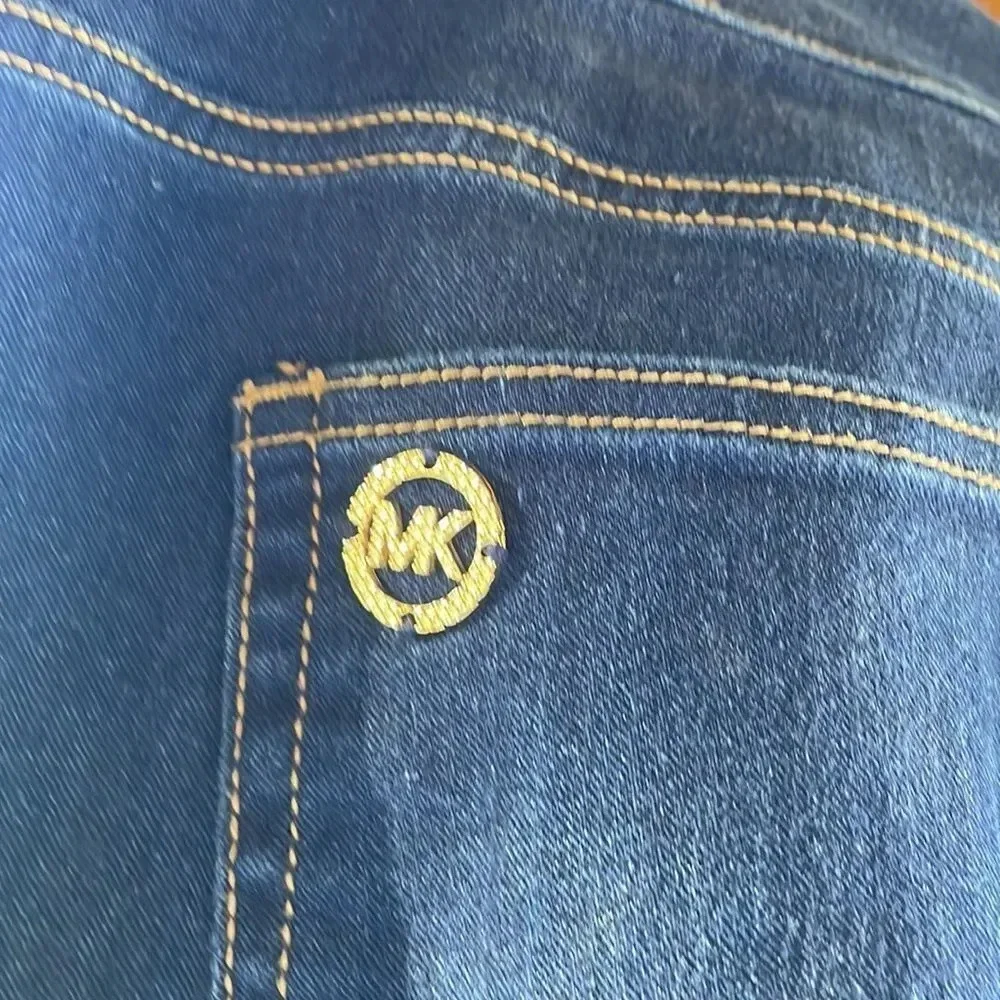 Michael Kors woman’s dark blue jeans. They are a size 10
